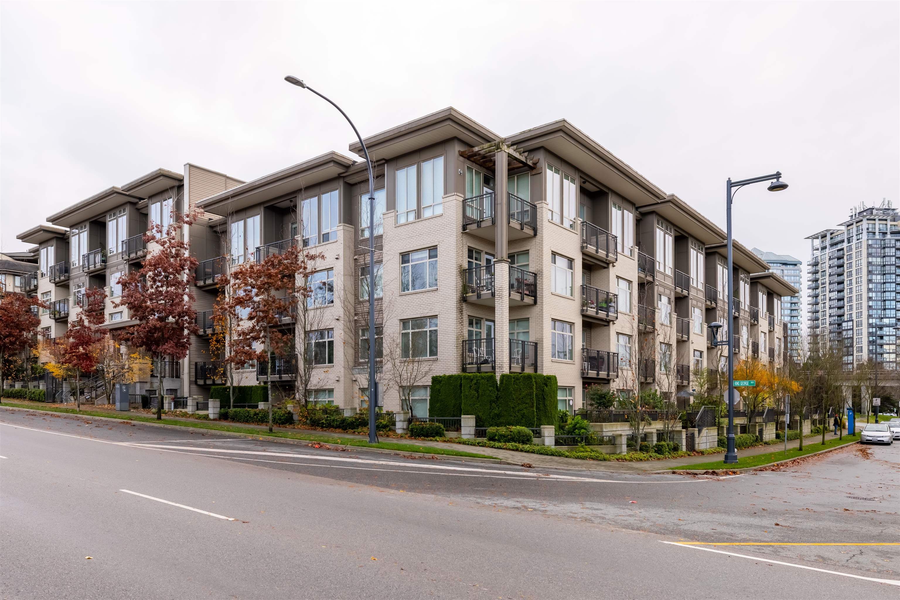 Main Photo: 103 13468 KING GEORGE Boulevard in Surrey: Whalley Condo for sale in "The Brookland" (North Surrey)  : MLS®# R2633385