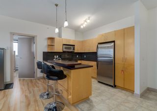 Photo 3: 323 69 Springborough Court SW in Calgary: Springbank Hill Apartment for sale : MLS®# A1174807