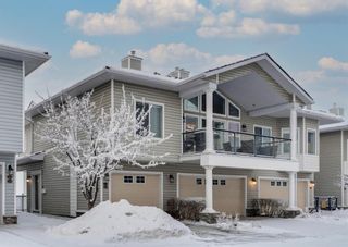 Photo 1: 126 Rocky Vista Terrace NW in Calgary: Rocky Ridge Row/Townhouse for sale : MLS®# A1063619