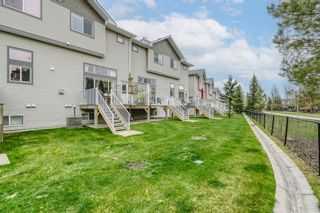 Photo 30: 42 Crystal Shores Cove: Okotoks Row/Townhouse for sale : MLS®# A1218306