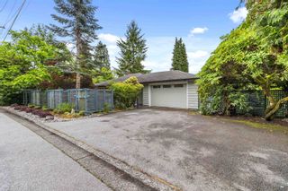 Photo 1: 3931 SUNNYCREST Drive in North Vancouver: Forest Hills NV House for sale : MLS®# R2791443