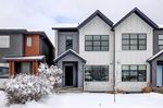 Main Photo: 517 36 Street SW in Calgary: Spruce Cliff Semi Detached (Half Duplex) for sale : MLS®# A2120598