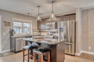 Photo 11: 10 1302 Russell Road NE in Calgary: Renfrew Row/Townhouse for sale : MLS®# A2043228