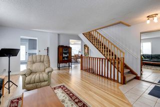Photo 3: 401 51 Avenue SW in Calgary: Windsor Park Detached for sale : MLS®# A1231521