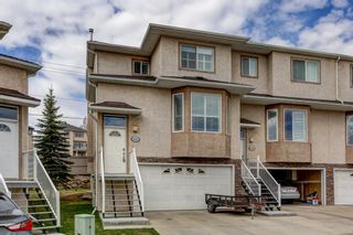 Photo 2: 118 Country Hills Gardens NW in Calgary: Country Hills Row/Townhouse for sale : MLS®# A1212986