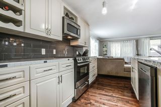 Photo 4: 297 201 CAYER Street in Coquitlam: Maillardville Manufactured Home for sale in "WILDWOOD PARK" : MLS®# R2162916