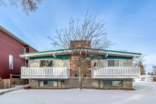 Photo 1: 704 702 54 Avenue SW in Calgary: Windsor Park Full Duplex for sale : MLS®# A2022825