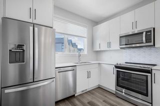 Photo 7: 18 Evanscrest Park NW in Calgary: Evanston Row/Townhouse for sale : MLS®# A2119227
