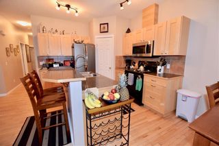Photo 4: 748 Carriage Lane Drive: Carstairs House for sale : MLS®# C4165695