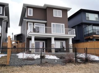Photo 3: 213 Crestmont Drive SW in Calgary: Crestmont Detached for sale : MLS®# A2041791