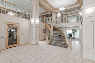 Photo 2: 121 6868 Sierra Morena Boulevard SW in Calgary: Signal Hill Apartment for sale : MLS®# A2069542