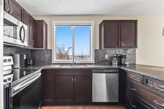 Photo 5: 8 122 Village Heights SW in Calgary: Patterson Apartment for sale : MLS®# A2126802
