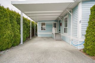 Photo 2: 11 8670 156 Street in Surrey: Fleetwood Tynehead Manufactured Home for sale in "Westwood Court" : MLS®# R2740175