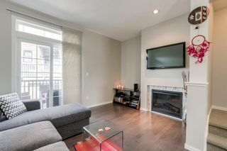 Photo 18: 235 ASCOT Circle SW in Calgary: Aspen Woods Row/Townhouse for sale : MLS®# A1025064