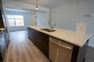 Photo 10: 407 185 Peguis Street in Winnipeg: Devonshire Village Condominium for sale (3K)  : MLS®# 202227229