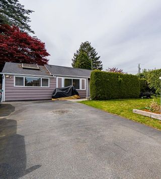 Main Photo: 1181 SILVERWOOD Crescent in North Vancouver: Norgate House for sale : MLS®# R2878428