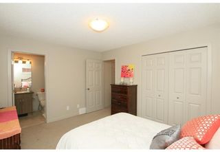 Photo 17: 110 Sunset Road: Cochrane Row/Townhouse for sale : MLS®# A1187469