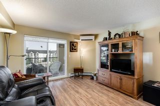 Photo 13: 7403 304 Mackenzie Way SW: Airdrie Apartment for sale : MLS®# A1251468