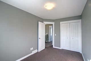 Photo 28: 204 CASCADES Passage: Chestermere Row/Townhouse for sale : MLS®# A1189058