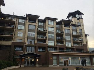 Photo 1: 411 1211 VILLAGE GREEN Way in Squamish: Downtown SQ Condo for sale in "ROCKCLIFFE" : MLS®# V1097477