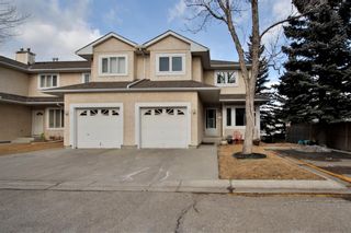Photo 1: 10 388 Sandarac Drive NW in Calgary: Sandstone Valley Row/Townhouse for sale : MLS®# A1181075