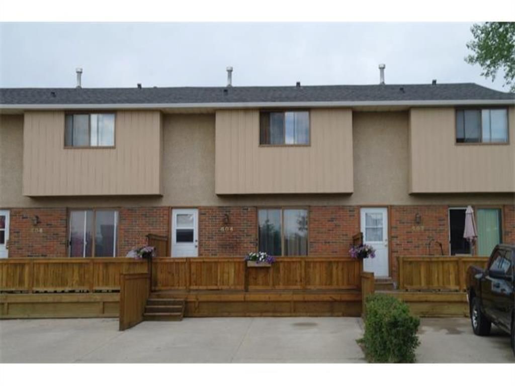 Main Photo: 604 Westchester Road: Strathmore Row/Townhouse for sale : MLS®# A1218976
