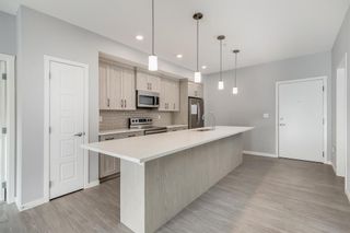 Photo 7: 103 4350 Seton Drive SE in Calgary: Seton Apartment for sale : MLS®# A2019190