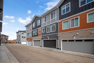 Photo 3: 603 335 Creekside Boulevard SW in Calgary: C-168 Row/Townhouse for sale : MLS®# A2120196