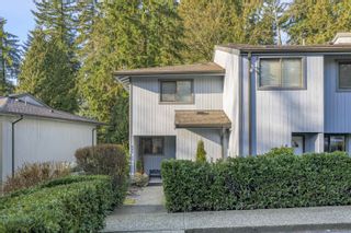 Photo 1: 843 BLACKSTOCK Road in Port Moody: North Shore Pt Moody Townhouse for sale in "WOODSIDE VILLAGE" : MLS®# R2748276
