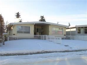 Photo 1: 619 68 Avenue SW in Calgary: Kingsland Detached for sale : MLS®# A2022704