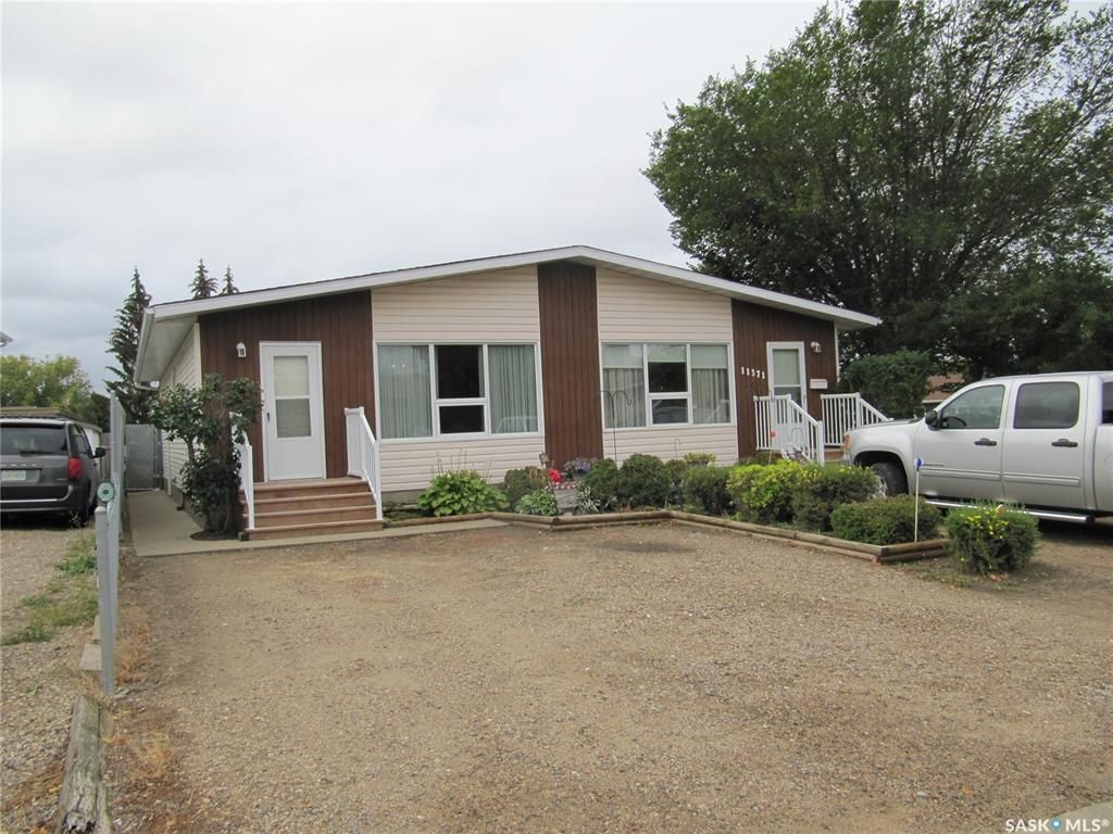 Main Photo: 11371 Clark Drive in North Battleford: Centennial Park Residential for sale : MLS®# SK909012