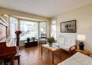 Photo 2: 84 Strathcona Close SW in Calgary: Strathcona Park Detached for sale : MLS®# A1203602