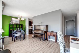 Photo 6: 1806 145 Point Drive NW in Calgary: Point McKay Apartment for sale : MLS®# A1064178