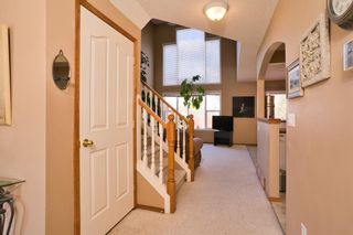 Photo 5: 202 Bridlewood Court SW in Calgary: Bridlewood Detached for sale : MLS®# A1220441