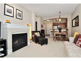 Photo 1: # 101 2969 WHISPER WY in Coquitlam: Westwood Plateau Condo for sale in "SUMMERLIN" : MLS®# V909010