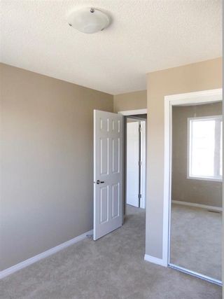 Photo 9: 464 WINDSTONE Grove SW: Airdrie Row/Townhouse for sale : MLS®# A2107159