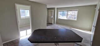 Photo 4: 101 70 Panatella Landing NW in Calgary: Panorama Hills Row/Townhouse for sale : MLS®# A2125453