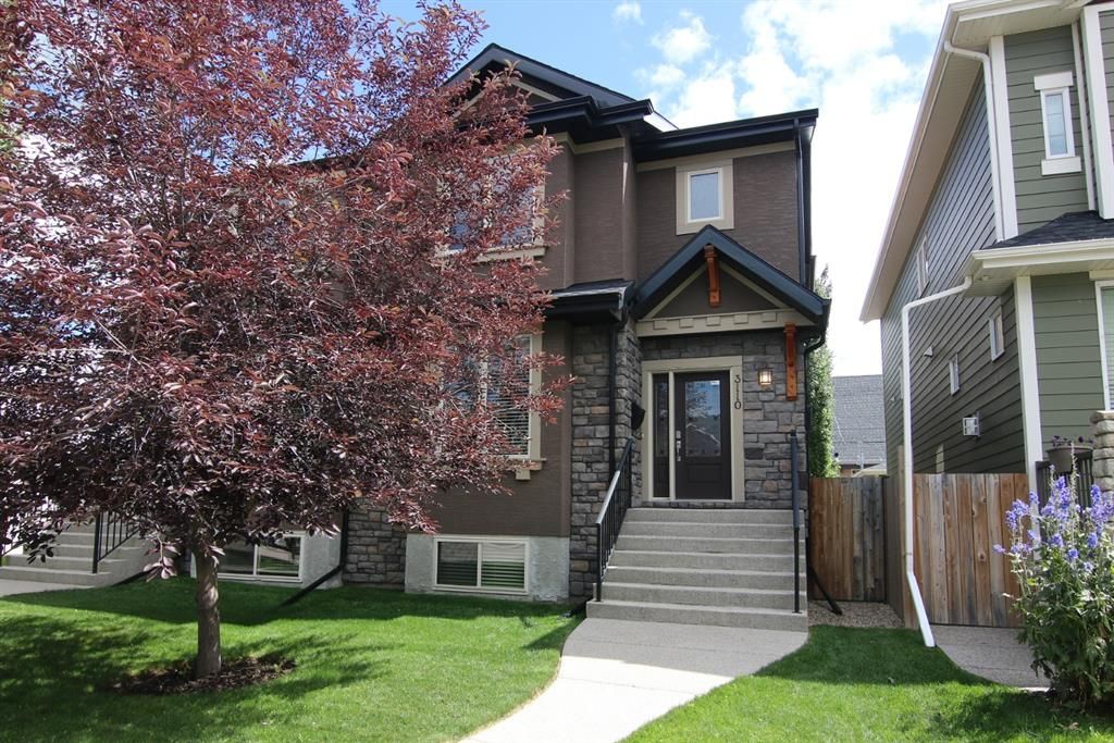 Main Photo: 3110 4A Street NW in Calgary: Mount Pleasant Semi Detached for sale : MLS®# A1059835
