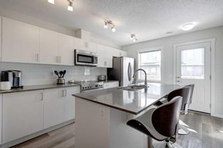 Photo 10: 253 Cranbrook Square SE in Calgary: Cranston Row/Townhouse for sale : MLS®# A2117728