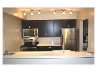 Photo 3: 104 1040 E BROADWAY in Vancouver: Mount Pleasant VE Condo for sale in "MARINERS MEWS" (Vancouver East)  : MLS®# V888262