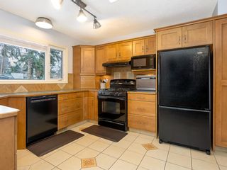 Photo 11: 1012 Hunterston Hill NW in Calgary: Huntington Hills Detached for sale : MLS®# A1205454