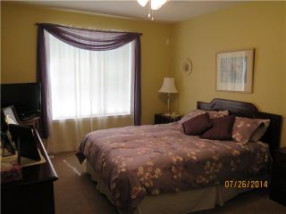 Photo 11: 124 305 FIRST Avenue NW: Airdrie Residential Attached for sale : MLS®# C3628634