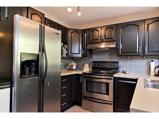 Photo 7: 907 WHITEHILL Way NE in Calgary: Whitehorn Residential Detached Single Family for sale : MLS®# C3634563