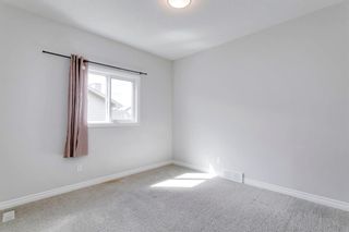 Photo 35: 25 Tremblant Terrace SW in Calgary: Springbank Hill Detached for sale : MLS®# A1240096