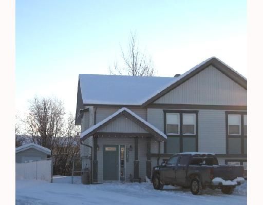 Main Photo: A 4415 HERITAGE Crescent in Fort_Nelson: Fort Nelson -Town 1/2 Duplex for sale in "MIDTOWN SUB" (Fort Nelson (Zone 64))  : MLS®# N172450