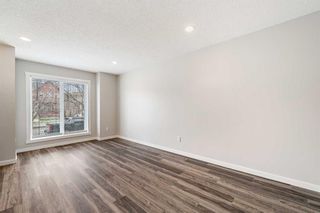 Photo 4: 205 2400 Ravenswood View SE: Airdrie Row/Townhouse for sale : MLS®# A2126467