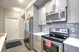 Photo 11: 102 6703 New Brighton Avenue SE in Calgary: New Brighton Apartment for sale : MLS®# A1215599