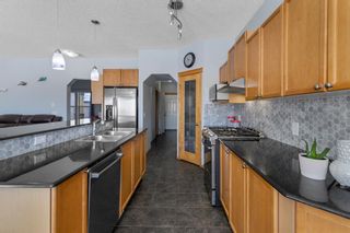 Photo 13: 141 Panatella Place NW in Calgary: Panorama Hills Detached for sale : MLS®# A1182425