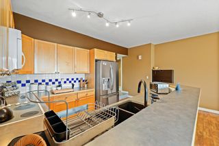 Photo 8: 104 6550 Old Banff Coach Road SW in Calgary: Patterson Apartment for sale : MLS®# A2013223