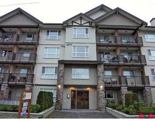Photo 1: 105 5465 203RD Street in Langley: Langley City Condo  in "Station 54" : MLS®# F2626460